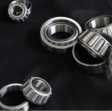 提高等截面薄壁軸承載荷能力的核心方法是什么？